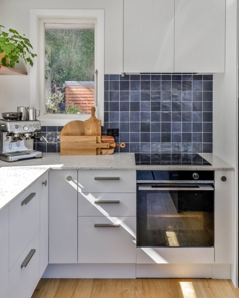 Statement White Kitchen with Blue Accents Ideas